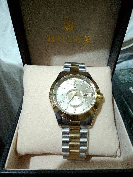 Rolex watch chronograph, golden & Silver, automatic 0