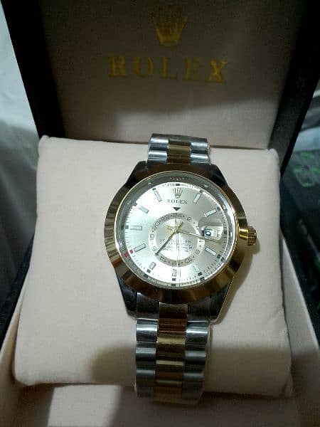 Rolex watch chronograph, golden & Silver, automatic 1
