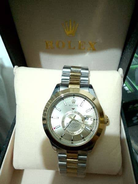 Rolex watch chronograph, golden & Silver, automatic 2