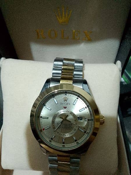 Rolex watch chronograph, golden & Silver, automatic 3