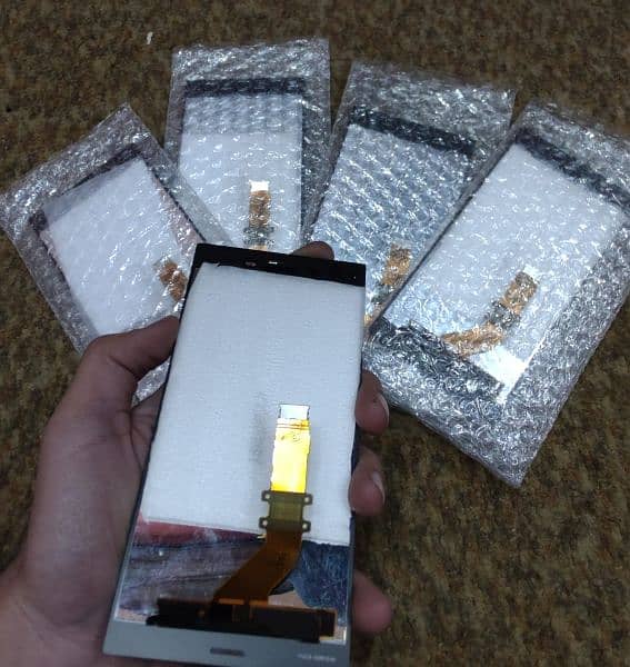 Sony Xperia all models all original panels and parts are available 4