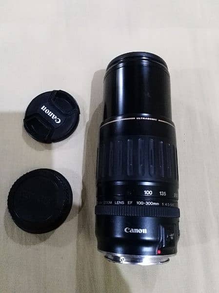 Canon lens 100 300 with caps 1