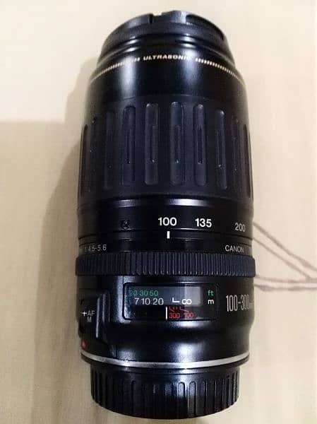Canon lens 100 300 with caps 2
