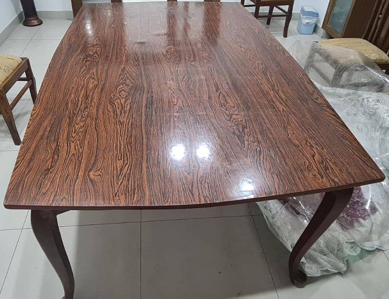 wooden dining table. 1