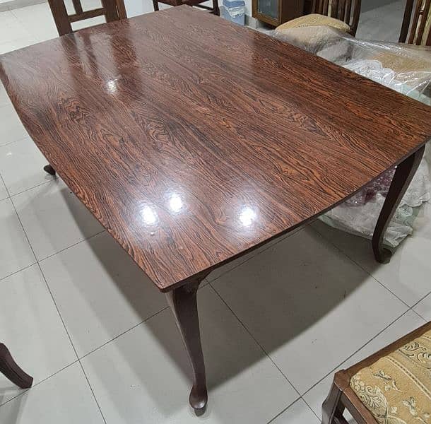 wooden dining table. 3