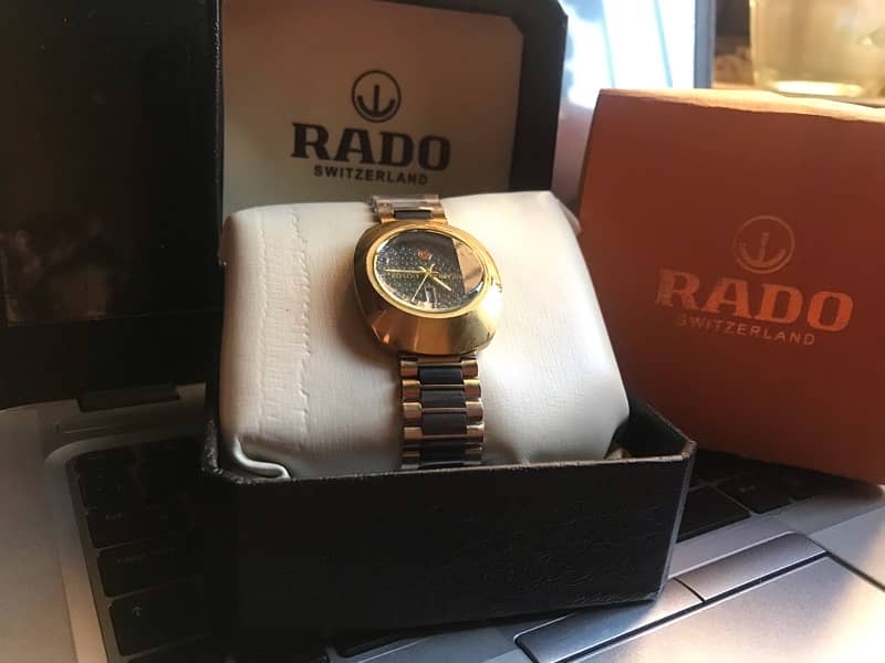 RADO WATCH WITH RADO BOX HIGH QUALITY DATE AND DA FREE DELIVRY Y 0