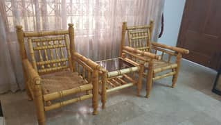 wooden yellow peeray chairs and table