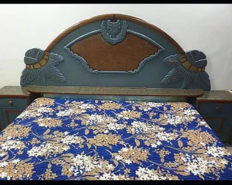 A wooden bed and dressing with side tables 1