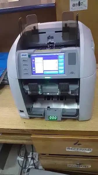 SM Multi currency mix bank cash counting machine, locker Pakistani 17