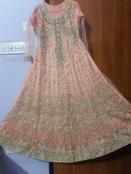 I am selling bridal dress in new condition 4