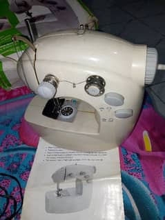Sewing machine cell & charger operated