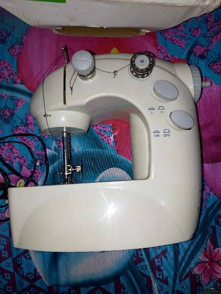 Sewing machine cell & charger operated 4