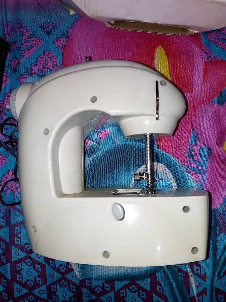 Sewing machine cell & charger operated 9