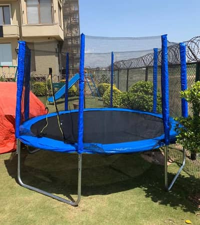 swing , slides , trampoline