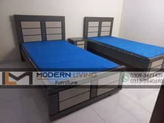 Stylish 2 single beds one side table