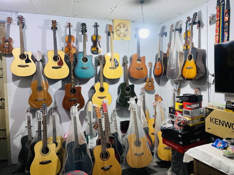 Acoustic bignners professhional guitars Violins Ukuelels Musical store 1