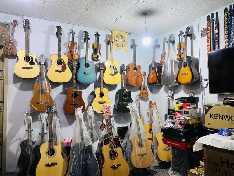 Acoustic bignners professhional guitars Violins Ukuelels Musical store 12