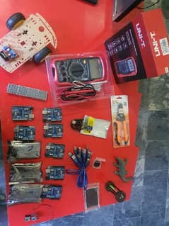 Arduino uno, TFT display, Car Chassis, Dot matrix, wire cutter, DMM