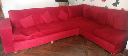 L shape sofa for sale. in red colour