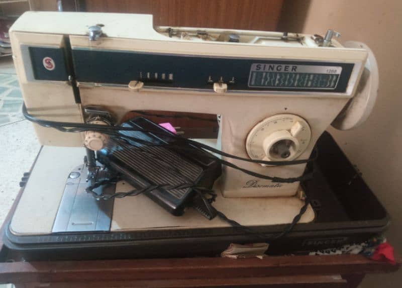 sewing machine singer brand dismatic 0