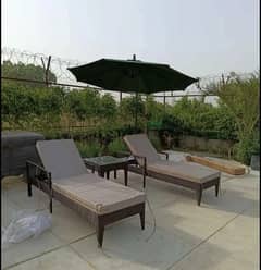 Outdoor Sidepole Umbrella and Pool side Loungers, Resting Relax Chairs