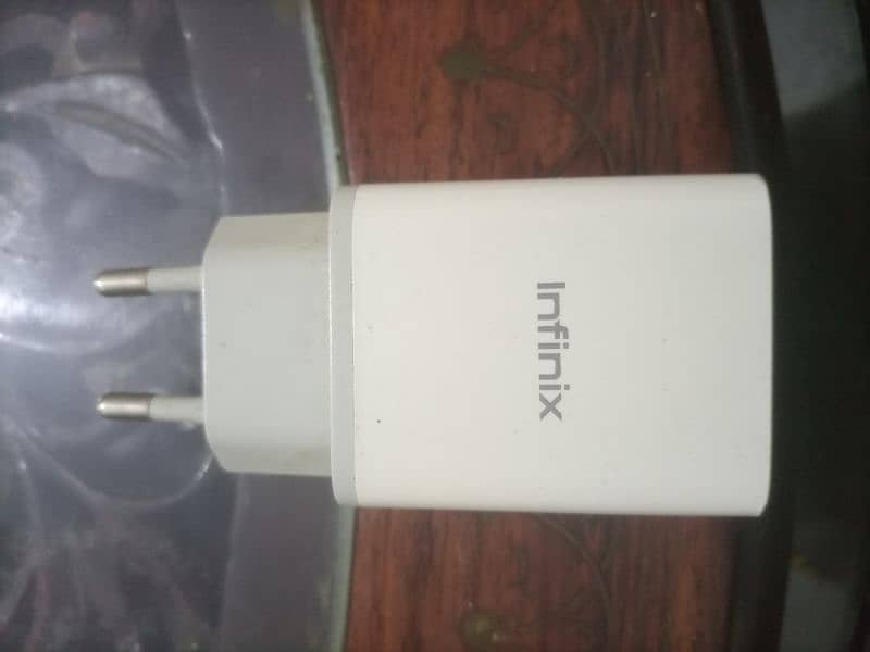 Infinix Note 7 original charger with original data cable. 0