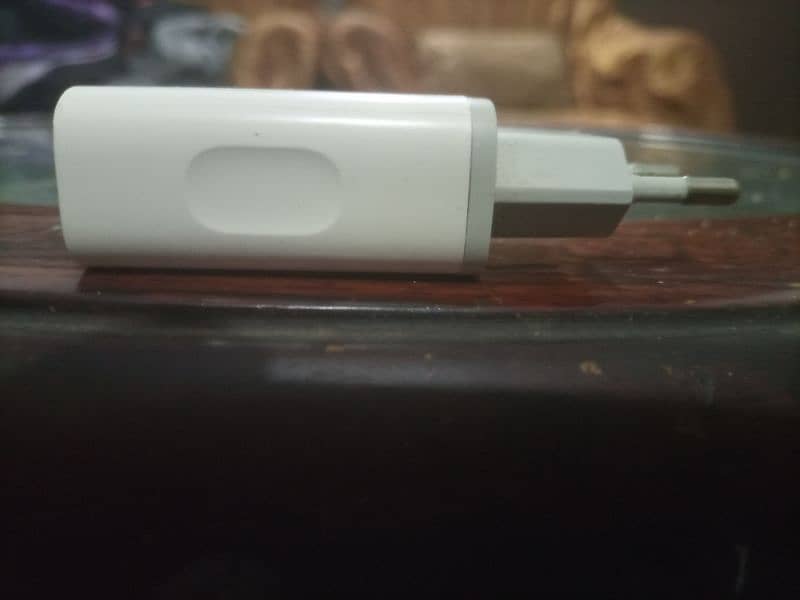 Infinix Note 7 original charger with original data cable. 2