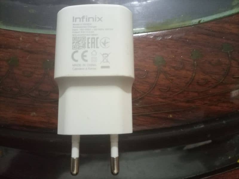 Infinix original charger with original data cable. 5