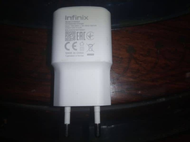Infinix original charger with original data cable. 6