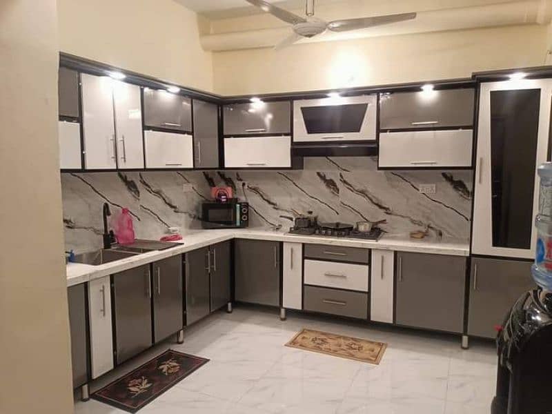 kitchen cabinet and granite 0