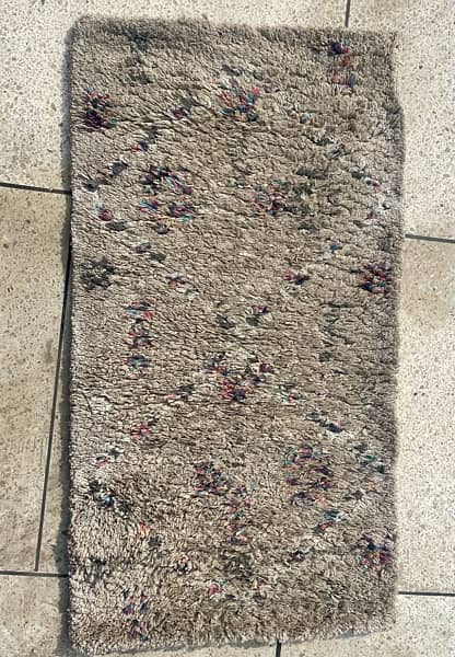 A Beautiful Small Beige Carpet 1