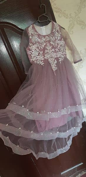 Chiffon long  tail frock 6 to 9 years size very good condition. . 2
