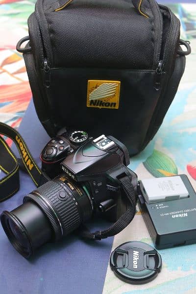 Nikon d3400 with 18/55mm Vr Dx. 1