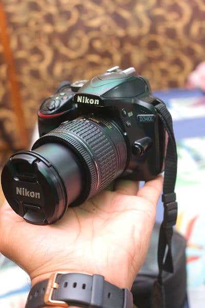 Nikon d3400 with 18/55mm Vr Dx. 0