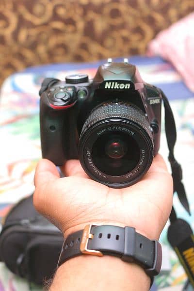 Nikon d3400 with 18/55mm Vr Dx. 4