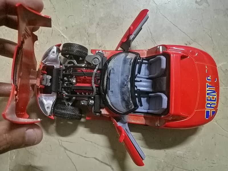 Diecast Bburago Scale 1/24 made in Italy. . . Both Dodge Viper models 18