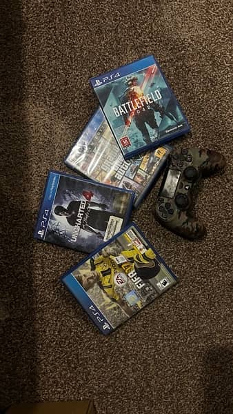 PS4 1TB with box and games 2