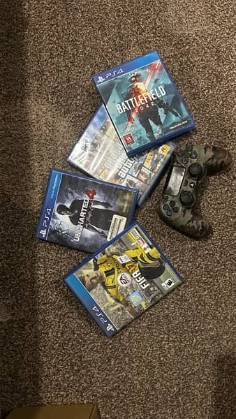 PS4 1TB with box and games 3