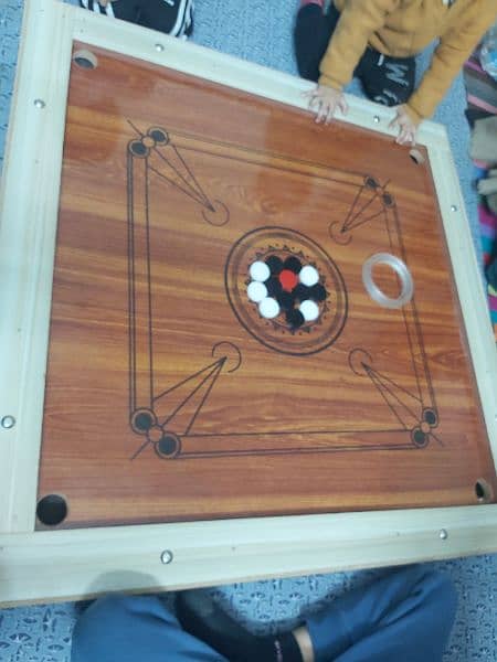 New carrom board with all carrom coins and striker 0