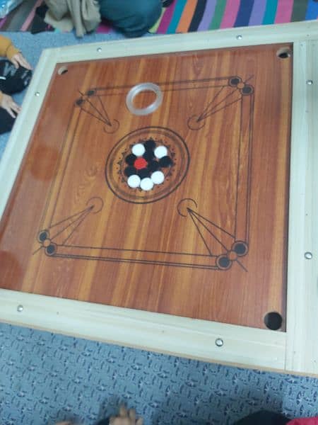New carrom board with all carrom coins and striker 3