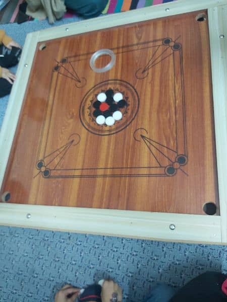 New carrom board with all carrom coins and striker 4