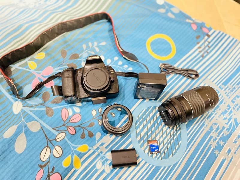 CANON EOS 60D DSLR WITH LENS FOR SELL. . . . 1