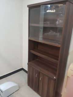 book shelf with cabinet