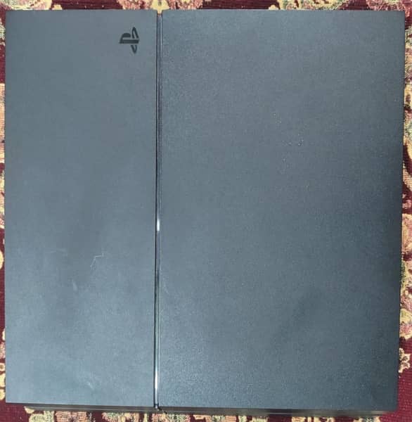 Playstation 4 (1tb) with 4 games 0