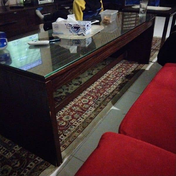 wooden Rectangle table with glass top in a very good condition 1