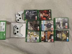 Xbox one s with 9 games and two controller