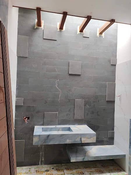marble and granite for flooring , stairsteps, kitchen top, vanity 17