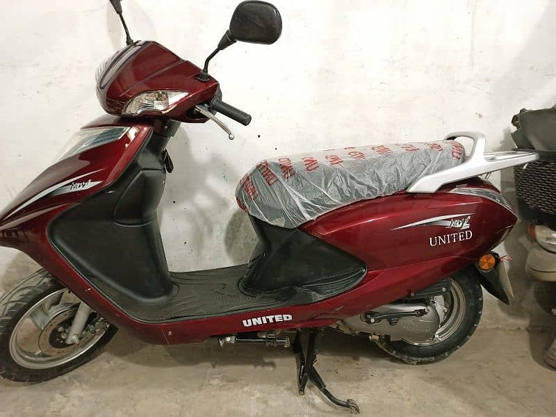 united scooty available contact at**03004142432** 2