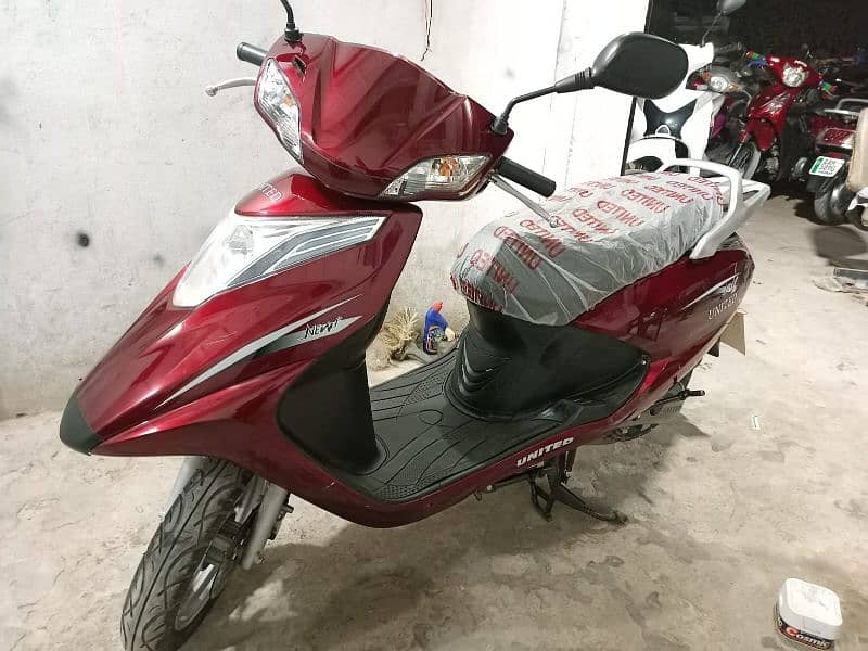 united scooty available contact at**03004142432** 1