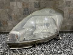 Toyota passo leftside headlight